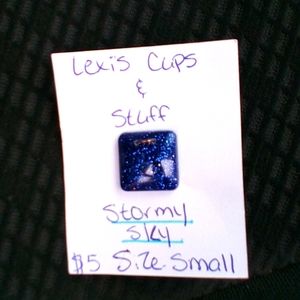 A dark blue square pendent size is small.
